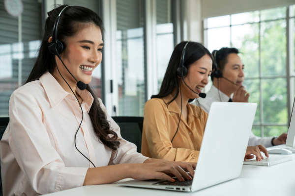 Customer support agents talking to customers online